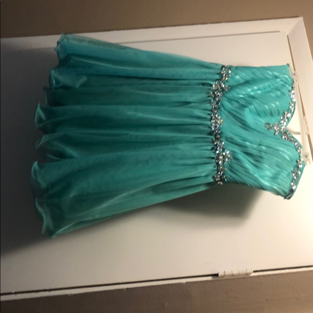 Short turquoise homecoming dress.